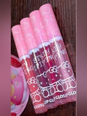 2 Hello Kitty Lip Gloss Mystery